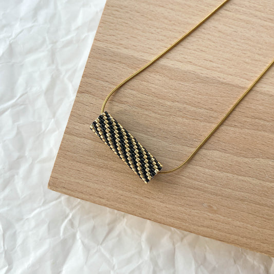 Black & Gold Twist Necklace