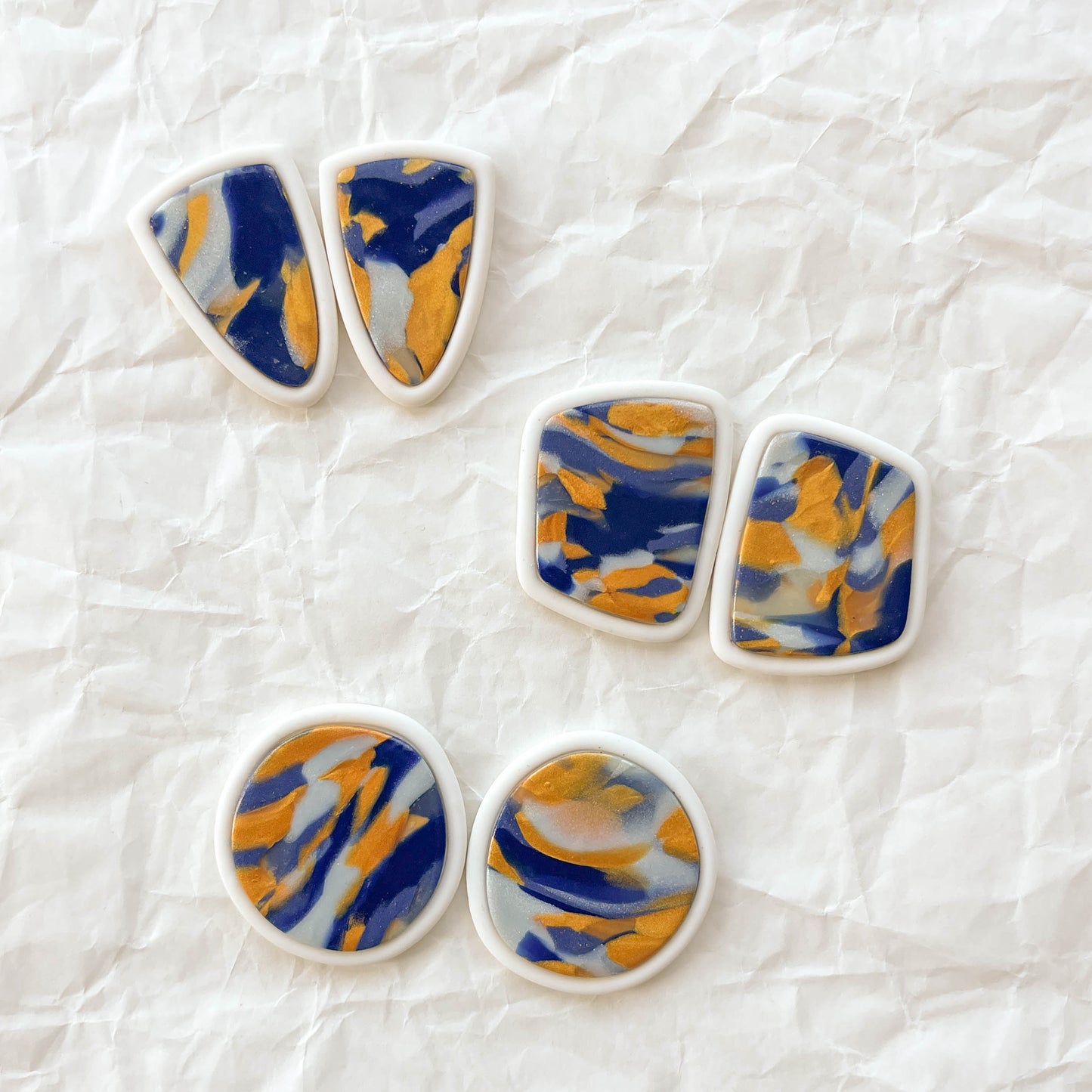 Bezel Swirl Studs