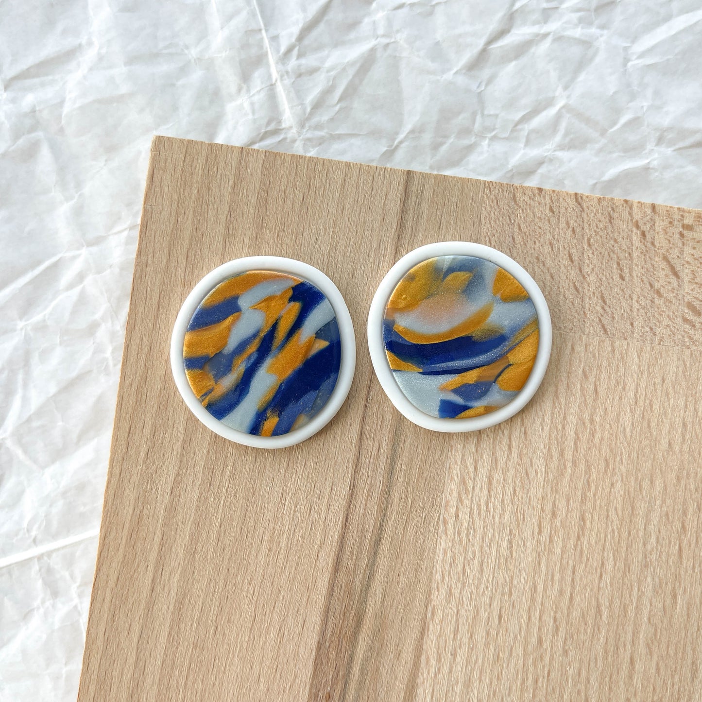 Bezel Swirl Studs