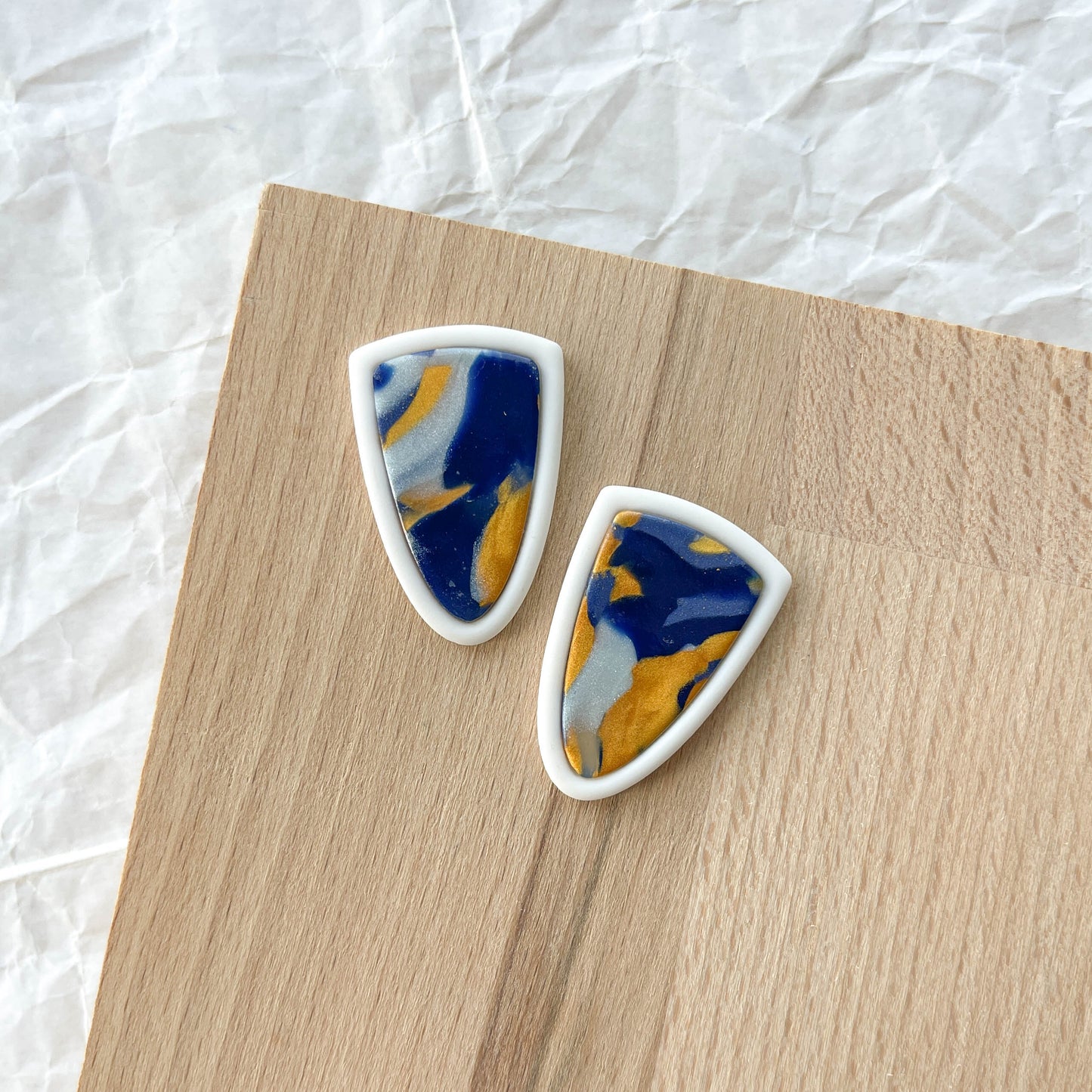 Bezel Swirl Studs