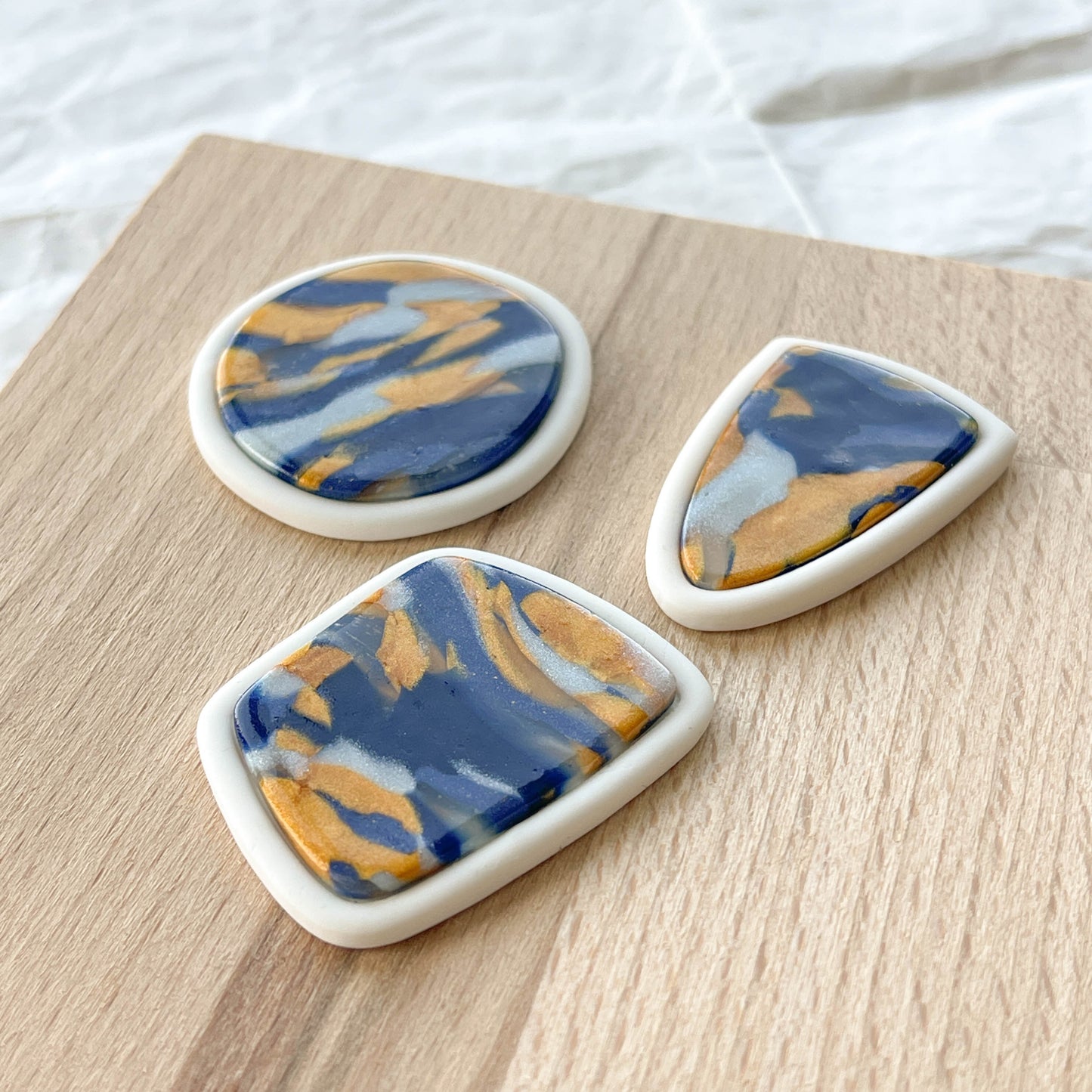 Bezel Swirl Studs