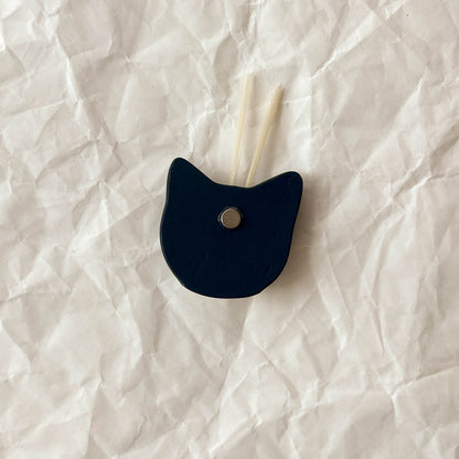 Magnetic cat whisker keeper