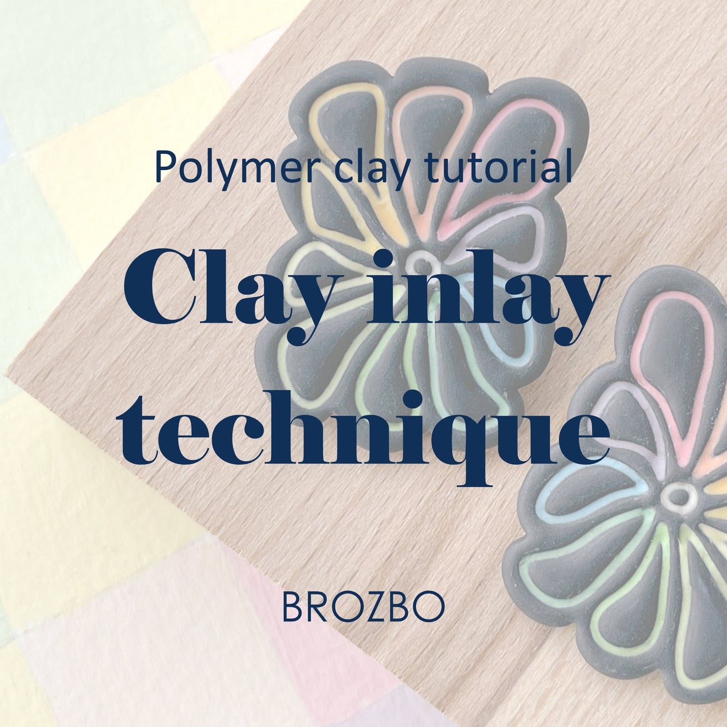 Promotional graphic for a polymer clay tutorial titled 'Clay inlay technique' by BROZBO, showing two flower-shaped clay inlays on a light wood background with pastel color blocks in the corner.