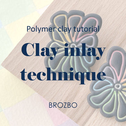 Promotional graphic for a polymer clay tutorial titled 'Clay inlay technique' by BROZBO, showing two flower-shaped clay inlays on a light wood background with pastel color blocks in the corner.